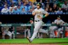 Oakland Athletics' Josh Phegley runs home to score on a triple by Marcus Semien during the second inning of a baseball game against the Kansas City Royals, Monday, Aug. 26, 2019, in Kansas City, Mo. (AP Photo/Charlie Riedel)