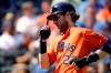 Houston Astros' Josh Reddick celebrates as he scores on a two-run double by Abraham Toro during the third inning of a baseball game against the Kansas City Royals Sunday, Sept. 15, 2019, in Kansas City, Mo. (AP Photo/Charlie Riedel)