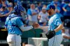 Kansas City Royals relief pitcher Ian Kennedy, right, and catcher Meibrys Viloria celebrate after a baseball game against the Baltimore Orioles, Sunday, Sept. 1, 2019, in Kansas City, Mo. (AP Photo/Charlie Riedel)