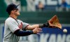 Minnesota Twins first baseman Tyler Austin can't make the catch on a single by Kansas City Royals' Martin Maldonado during the eighth inning of a baseball game Wednesday, April 3, 2019, in Kansas City, Mo. (AP Photo/Charlie Riedel)