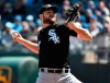 Chicago White Sox starting pitcher Lucas Giolito throws in the first inning of a baseball game against the Kansas City Royals, Sunday, March 31, 2019, in Kansas City, Mo. (AP Photo/Ed Zurga)