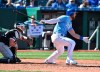 Kansas City Royals' Alex Gordon, right, singles in the seventh inning during a baseball game against the Chicago White Sox, Sunday, March 31, 2019, in Kansas City, Mo. Gordon's single broke up a no-hitter by White Sox starting pitcher Lucas Giolito. (AP Photo/Ed Zurga)