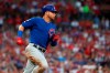 Chicago Cubs' Willson Contreras rounds first on a single during the third inning of the team's baseball game against the St. Louis Cardinals on Wednesday, July 31, 2019, in St. Louis. Contreras was tagged out at second trying to stretch the single into a double. (AP Photo/Jeff Roberson)