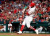 St. Louis Cardinals' Dexter Fowler hits a ground-rule double to score two runs during the second inning of the team's baseball game against the Pittsburgh Pirates on Thursday, May 9, 2019, in St. Louis. (AP Photo/Jeff Roberson)