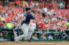 Milwaukee Brewers' Keston Hiura follows through on an RBI single during the first inning of a baseball game against the St. Louis Cardinals Wednesday, Aug. 21, 2019, in St. Louis. (AP Photo/Jeff Roberson)