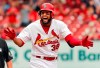 St. Louis Cardinals' Jose Martinez celebrates after hitting an RBI double during the sixth inning of a baseball game against the Los Angeles Dodgers Thursday, April 11, 2019, in St. Louis. (AP Photo/Jeff Roberson)