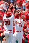 St. Louis Cardinals' Paul Goldschmidt (46) is congratulated by teammate Jose Martinez (38) after hitting a three-run home run during the seventh inning of a baseball game against the Pittsburgh Pirates Wednesday, July 17, 2019, in St. Louis. (AP Photo/Jeff Roberson)