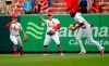 St. Louis Cardinals' Harrison Bader (48) celebrates with teammates Tyler O'Neill, left, and Jose Martinez following an 11-7 victory over the Los Angeles Dodgers in a baseball game Thursday, April 11, 2019, in St. Louis. (AP Photo/Jeff Roberson)
