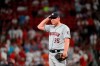 Houston Astros relief pitcher Will Harris pauses after giving up a solo home run to St. Louis Cardinals' Matt Wieters during the seventh inning of a baseball game Friday, July 26, 2019, in St. Louis. (AP Photo/Jeff Roberson)
