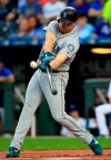 Seattle Mariners' Jay Bruce hits a solo home run off Kansas City Royals starting pitcher Jakob Junis during the first inning of a baseball game at Kauffman Stadium in Kansas City, Mo., Tuesday, April 9, 2019. (AP Photo/Orlin Wagner)