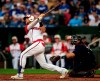 Kansas City Royals' Hunter Dozier hits a three-run home run off Minnesota Twins starting pitcher Michael Pineda during the third inning of a baseball game at Kauffman Stadium in Kansas City, Mo., Sunday, June 23, 2019. (AP Photo/Orlin Wagner)