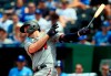 Minnesota Twins' C.J. Cron hits a solo home run off Kansas City Royals starting pitcher Danny Duffy during the eighth inning of a baseball game at Kauffman Stadium in Kansas City, Mo., Saturday, June 22, 2019. (AP Photo/Orlin Wagner)