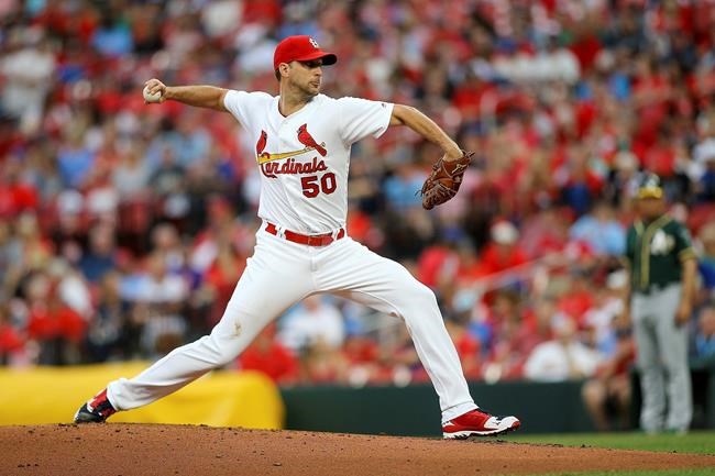 St. Louis Cardinals starting pitcher Adam Wainwright (50) delivers during the second inning of a baseball game against the Oakland Athletics Wednesday, June 26, 2019, in St. Louis. (AP Photo/Scott Kane)