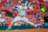 Los Angeles Dodgers starting pitcher Hyun-Jin Ryu throws during the first inning of a baseball game against the St. Louis Cardinals, Monday, April 8, 2019, in St. Louis. (AP Photo/Scott Kane)