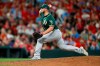 Oakland Athletics relief pitcher J.B. Wendelken throws during the fourth inning of the team's baseball game against the St. Louis Cardinals on Tuesday, June 25, 2019, in St. Louis. (AP Photo/Scott Kane)