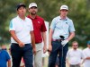 Byeong Hun An, left, and George McNeill, center, watch the drive from the second tee by J.T. Poston during the third round of the Sanderson Farms Championship golf tournament in Jackson, Miss., Saturday, Sept. 21, 2019. (AP Photo/Rogelio V. Solis)