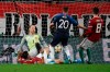 Slovakia's Robert Mak, center, shoots to score the opening goal during the Euro 2020 Group E qualifying soccer match between Hungary and Slovakia in Groupama Arena in Budapest, Hungary, Monday, Sept. 9, 2019. (Tamas Kovacs/MTI via AP)