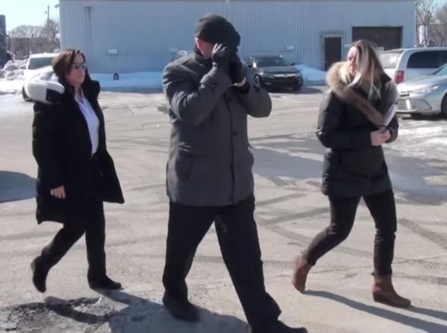 In this image from video, police take Mario Monette into custody in Longueuil, Que. Police have arrested a pastor from suburban Montreal and his wife on charges that over a 45-year period they used corporal punishment on children and encouraged their followers to do the same. THE CANADIAN PRESS/HO- Longueuil Police MANDATORY CREDIT