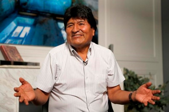 Former Bolivian President Evo Morales speaks during an interview with The Associated Press in Mexico City, Thursday, Nov. 14, 2019. Mexico granted asylum to Morales, who resigned on Nov. 10, under mounting pressure from the military and the public after his re-election victory triggered weeks of fraud allegations and deadly protests. (AP Photo/Eduardo Verdugo)