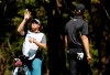 Shawn Spieth catches a ball thrown by his son Jordan Spieth during the first day of competition of the WGC-Mexico Championship at the Chapultepec Golf Club in Mexico City, Thursday, Feb. 21, 2019. Spieth‚Äôs father caddied nine holes of practice Wednesday and will be on the bag the rest of the week after Spieth's caddie left because of the death of his father. (AP Photo/Marco Ugarte)