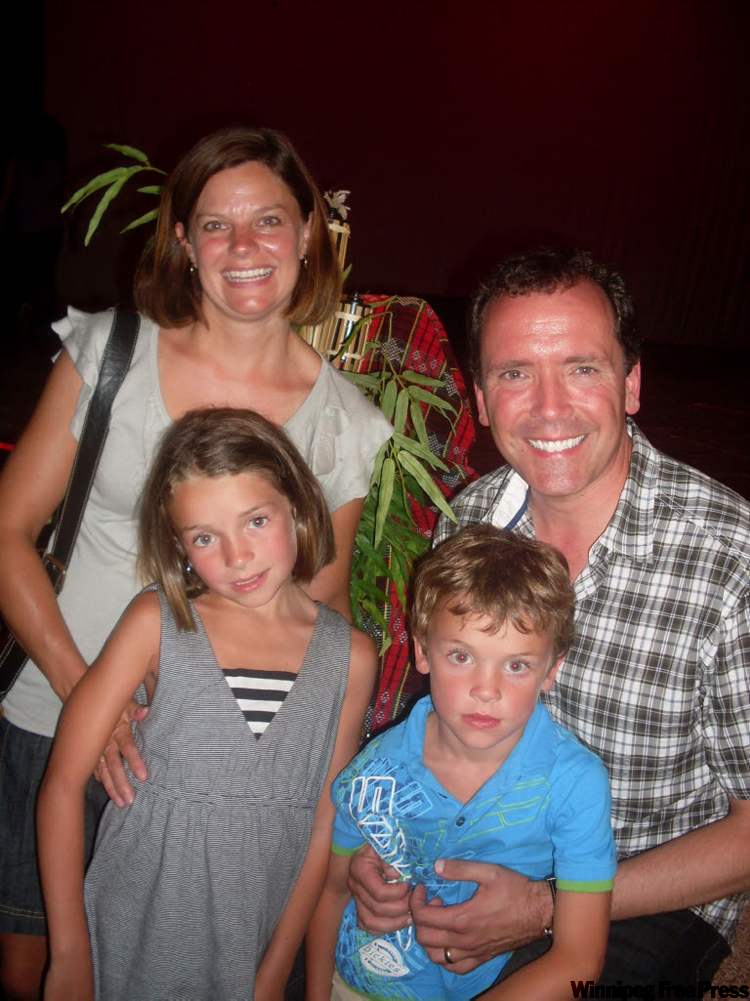 MAUREEN SCURFIELD/ WINNIPEG FREE PRESS
Hugh McFadyen, with wife Jennifer and children Rachael and James at Folklorama.