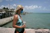 Israel Leal / the associated press
A tourist wears a protective mask while walking on the pier to the ferry headed to Isla Mujeres in Cancun, Mexico yesterday.