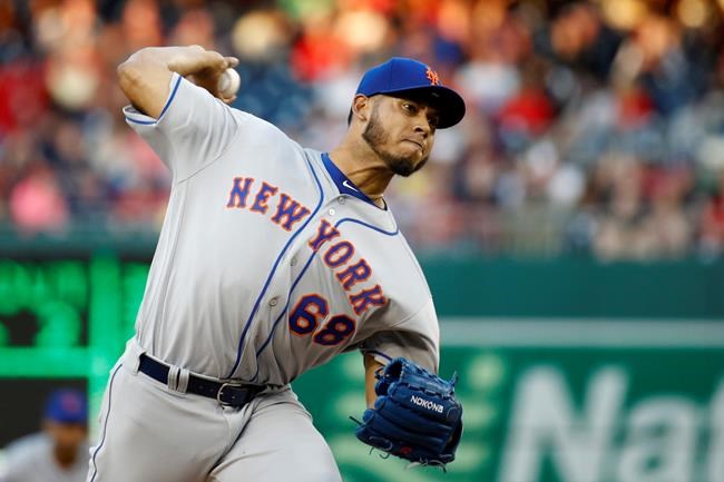 New York Mets starting pitcher Wilmer Font throws to the Washington Nationals in the second inning of a baseball game, Wednesday, May 15, 2019, in Washington. (AP Photo/Patrick Semansky)