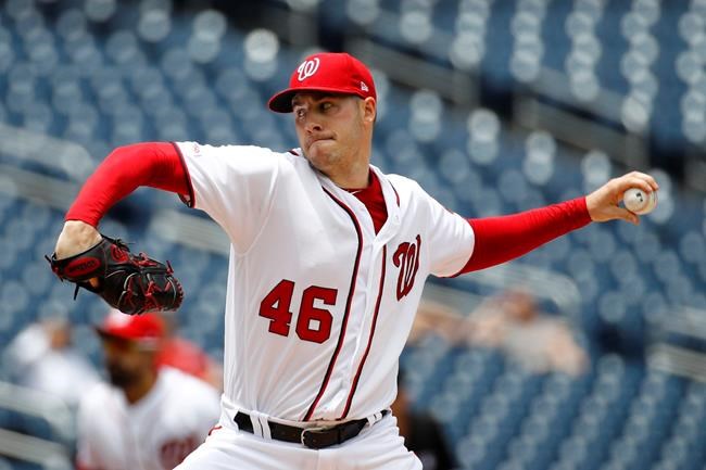 Washington Nationals starting pitcher Patrick Corbin throws to the Philadelphia Phillies in the second inning of the first baseball game of a doubleheader, Wednesday, June 19, 2019, in Washington. (AP Photo/Patrick Semansky)