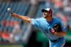 Washington Nationals starting pitcher Max Scherzer delivers during the first inning of a baseball game against the Kansas City Royals, Saturday, July 6, 2019, in Washington. The Nationals are paying tribute to the Montreal Expos in Saturday's game by wearing throwback uniforms. (AP Photo/Nick Wass)