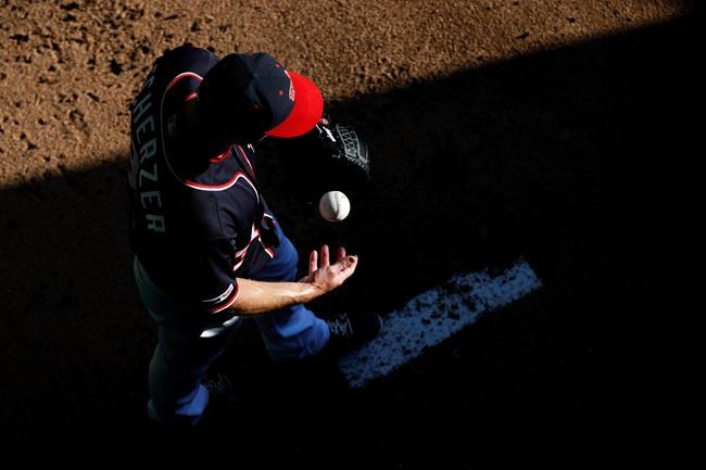 Washington Nationals starting pitcher Max Scherzer warms up in the bullpen before the team's baseball game against the Arizona Diamondbacks, Friday, June 14, 2019, in Washington. (AP Photo/Patrick Semansky)