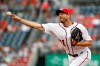 Washington Nationals starting pitcher Max Scherzer throws to the Colorado Rockies in the third inning of a baseball game, Thursday, July 25, 2019, in Washington. (AP Photo/Patrick Semansky)