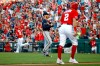 Atlanta Braves starting pitcher Mike Foltynewicz, center, stands on the field as Washington Nationals' Matt Adams (15) and Adam Eaton (2) round the bases on Adams' two-run home run in the first inning of a baseball game, Saturday, June 22, 2019, in Washington. (AP Photo/Patrick Semansky)