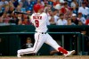 Washington Nationals' Brian Dozier watches his two-run home run in the sixth inning of a baseball game against the Miami Marlins, Wednesday, July 3, 2019, in Washington. (AP Photo/Patrick Semansky)