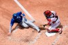Kansas City Royals' Alex Gordon, left, is out at the plate against Washington Nationals catcher Yan Gomes, right, during the fourth inning of a baseball game, Sunday, July 7, 2019, in Washington. (AP Photo/Nick Wass)