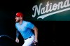Washington Nationals pitcher Stephen Strasburg walks out of the clubhouse to participate in a baseball workout, Friday, Oct. 18, 2019, in Washington, in advance of the team's appearance in the World Series. (AP Photo/Patrick Semansky)