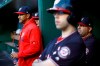 Washington Nationals manager Dave Martinez, left, watches the first inning of the team's baseball game against the New York Mets, Tuesday, May 14, 2019, in Washington. (AP Photo/Patrick Semansky)