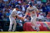 Los Angeles Dodgers' Will Smith (16) is greeted by third base coach Dino Ebel, left, as he rounds the bases after his home run during the third inning of a baseball game against the Washington Nationals, Saturday, July 27, 2019, in Washington. (AP Photo/Nick Wass)