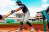 Cleveland Indians Francisco Lindor returns to the dugout after scoring on a solo home run during the third inning of a baseball game against the Washington Nationals at Nationals Park, Sunday, Sept. 29, 2019, in Washington. (AP Photo/Andrew Harnik)
