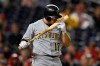 Pittsburgh Pirates' JB Shuck reacts during his at-bat in the ninth inning of a baseball game against the Washington Nationals, Friday, April 12, 2019, in Washington. (AP Photo/Nick Wass)