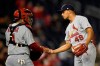 St. Louis Cardinals relief pitcher Jordan Hicks (49) celebrates with catcher Yadier Molina (4) after a baseball game against the Washington Nationals, Monday, April 29, 2019, in Washington. (AP Photo/Nick Wass)