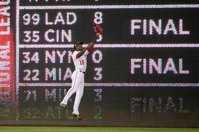 Washington Nationals center fielder Victor Robles (16) leaps up to catch a line drive by Chicago Cubs' Addison Russell for an out during the ninth inning of a baseball game, Sunday, May 19, 2019, in Washington. The Cubs won 6-5. (AP Photo/Nick Wass)