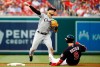 Chicago White Sox second baseman Yolmer Sanchez, left, throws to first base for a double play after forcing out Washington Nationals' Brian Dozier on Victor Robles's ground ball in the second inning of an interleague baseball game, Tuesday, June 4, 2019, in Washington. (AP Photo/Patrick Semansky)