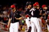 Washington Nationals starting pitcher Austin Voth, left, walks off the field after being relieved in the fifth inning of a baseball game against the Kansas City Royals, Friday, July 5, 2019, in Washington. (AP Photo/Patrick Semansky)