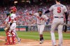 Atlanta Braves Ronald Acuna Jr., center, is congratulated by teammate Freddie Freeman, right, after scoring a run during the seventh inning of a baseball game against the Washington Nationals in Washington, Saturday, Sept. 14, 2019. (AP Photo/Manuel Balce Ceneta)