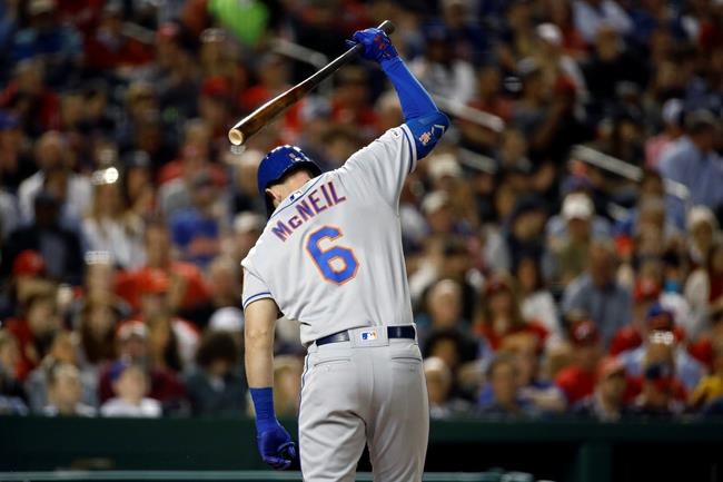 New York Mets' Jeff McNeil reacts after striking out in the fifth inning of a baseball game against the Washington Nationals, Wednesday, May 15, 2019, in Washington. Washington won 5-1. (AP Photo/Patrick Semansky)