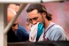 Atlanta Braves Charlie Culberson is taken out of the field after getting hit by a ball during the seventh inning of a baseball game against the Washington Nationals in Washington, Saturday, Sept. 14, 2019. (AP Photo/Manuel Balce Ceneta)