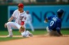 Washington Nationals shortstop Trea Turner (7) waits for the ball as Kansas City Royals' Terrance Gore (0) steals second base during the eighth inning of a baseball game, Sunday, July 7, 2019, in Washington. (AP Photo/Nick Wass)