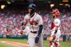 Atlanta Braves Ronald Acuna Jr., runs back to their dugout after scoring a run during the seventh inning of a baseball game against the Washington Nationals in Washington, Saturday, Sept. 14, 2019. (AP Photo/Manuel Balce Ceneta)