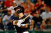 Washington Nationals' Kurt Suzuki watches his game-winning three-run home run in the team's baseball game against the New York Mets, Tuesday, Sept. 3, 2019, in Washington. Washington won 11-10. (AP Photo/Patrick Semansky)