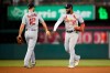 St. Louis Cardinals' Marcell Ozuna (23) celebrates with Paul DeJong (12) after the team's baseball game against the Washington Nationals, Wednesday, May 1, 2019, in Washington. The Cardinals won 5-1. (AP Photo/Nick Wass)